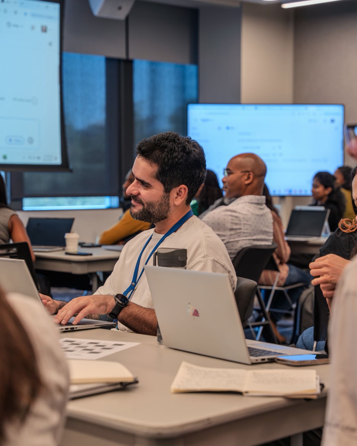 Agents in a hands-on workshop with laptops